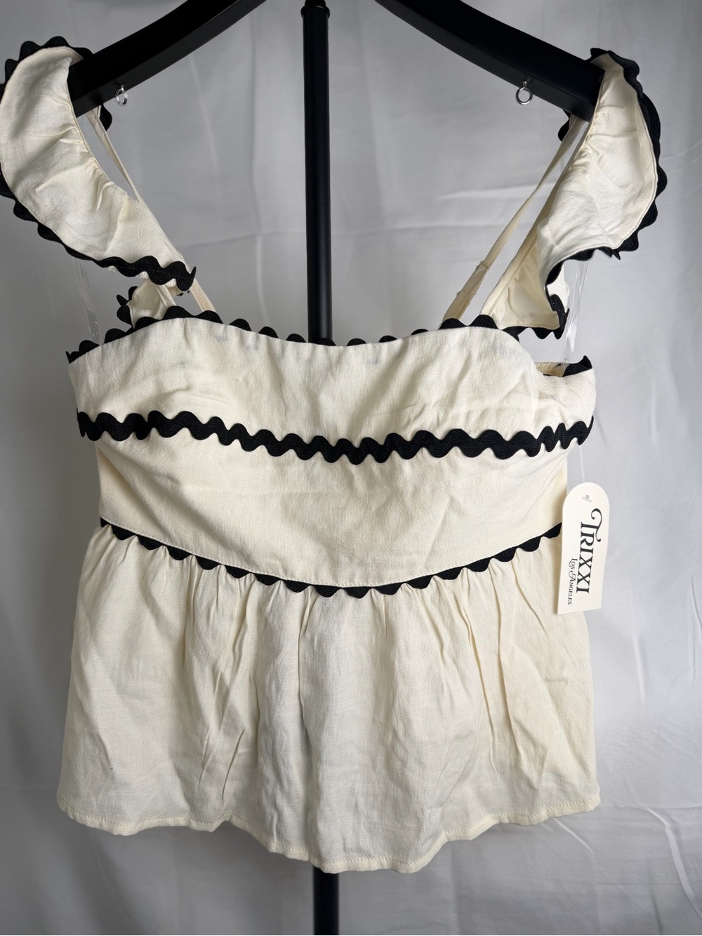 Trixxi Cream Peplum Camisole with Black Rickrack Trim